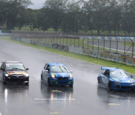 Three wide down the main straight